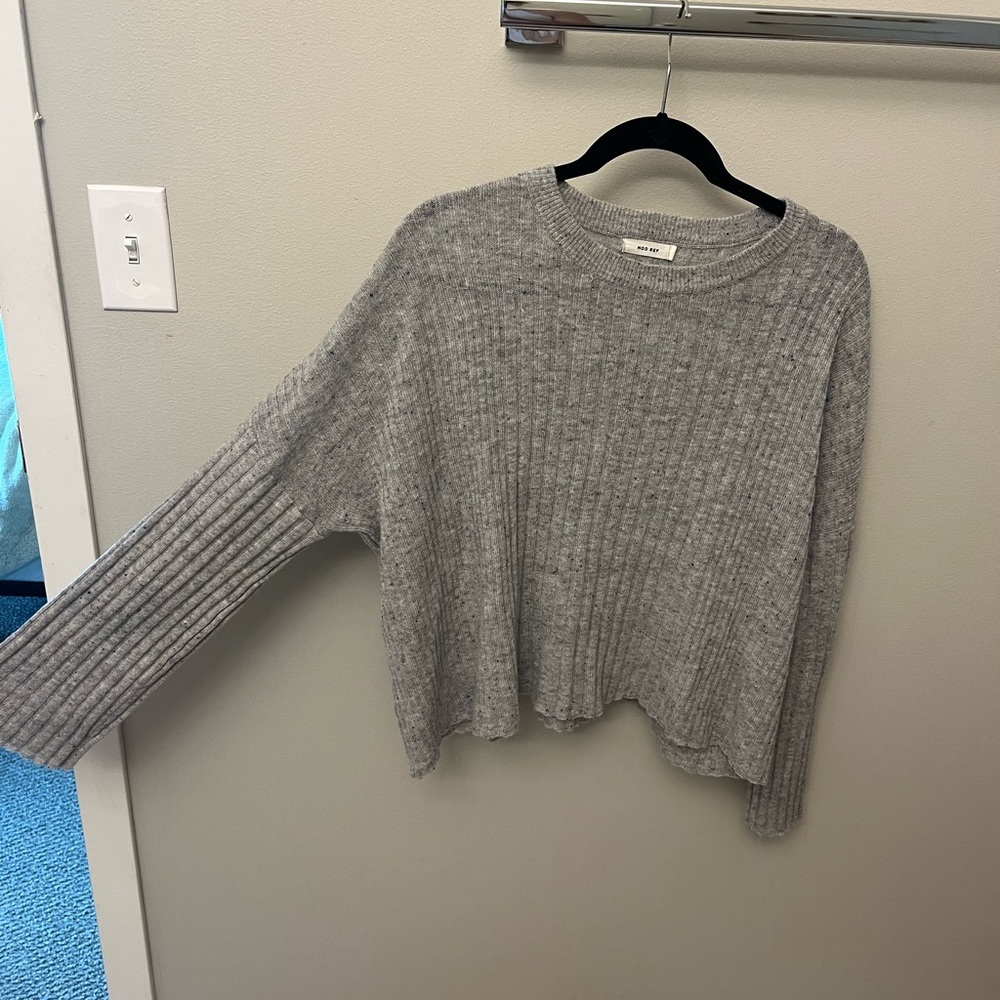 Tin sweater with bell sleeves. Grey with subtle blue and pink speckles.